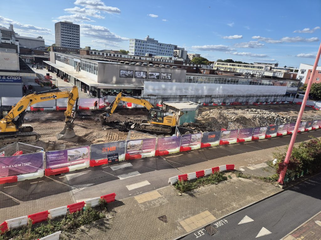 Demolition of the old Harlow bus station with a fleet of bulldozers